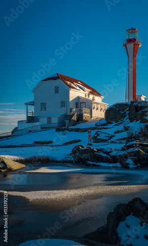 Cape Forchu lighthouse at dusk photo