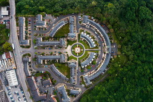 Aerial view directly above a new build housing estate in the UK with circular design