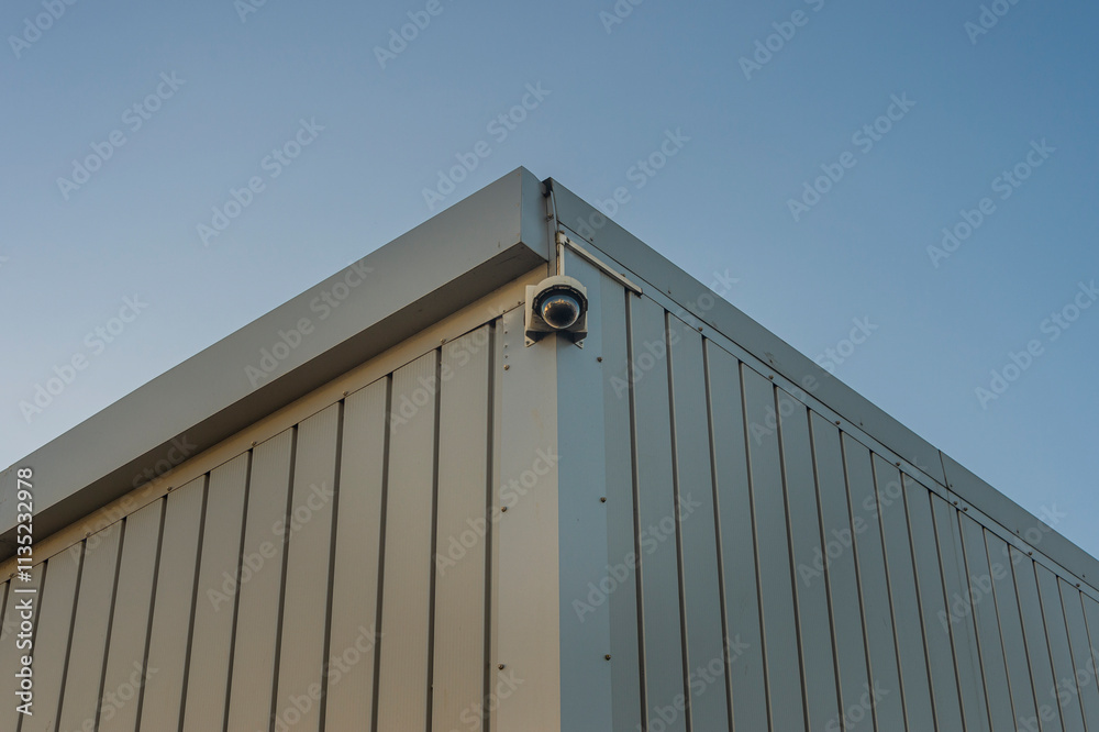 security camera on side of an industrial building security camera on side of an industrial building