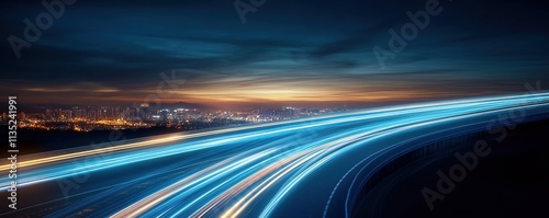 Abstract road illuminated by blue light trails representing speed and digitization against a twilight urban backdrop photo