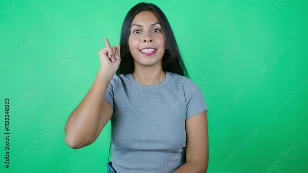 Mexican woman thoughtfully comes up with a great idea and smiles with emotion, concept of surprise Mexican woman thoughtfully comes up with a great idea and smiles with emotion, concept of surprise