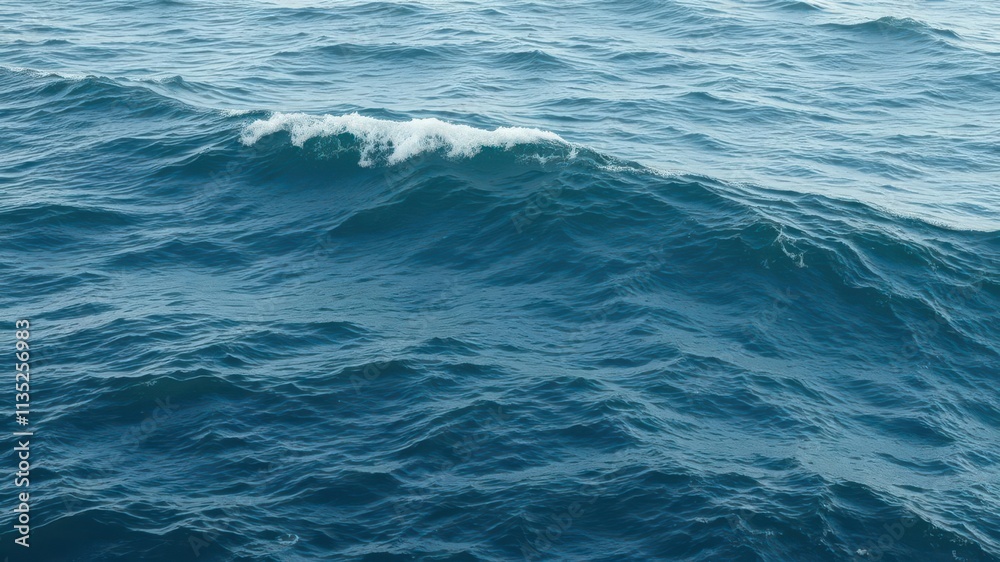 Deep blue ocean, textured waves, white foam crests, seafoam,current Deep blue ocean, textured waves, white foam crests, seafoam,current