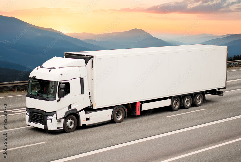 Obraz premium Refrigerated Cargo Truck for Sensitive Deliveries In Motion On Mountain Highway