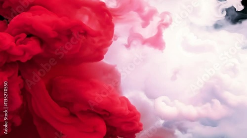 Slow-motion collision of red and white clouds on a black background