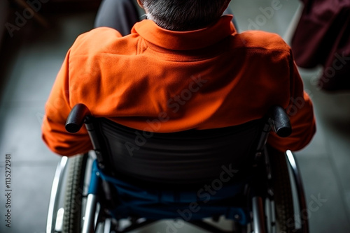 Senior in a wheelchair sharing a message of inclusion on the International Day of Persons with Disabilities.