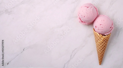 Delicious pink ice cream cones arranged on a light marble surface ready to be...