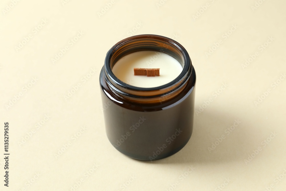 Handmade scented candle in a glass. Soy wax candle with a wooden wick Handmade scented candle in a glass. Soy wax candle with a wooden wick