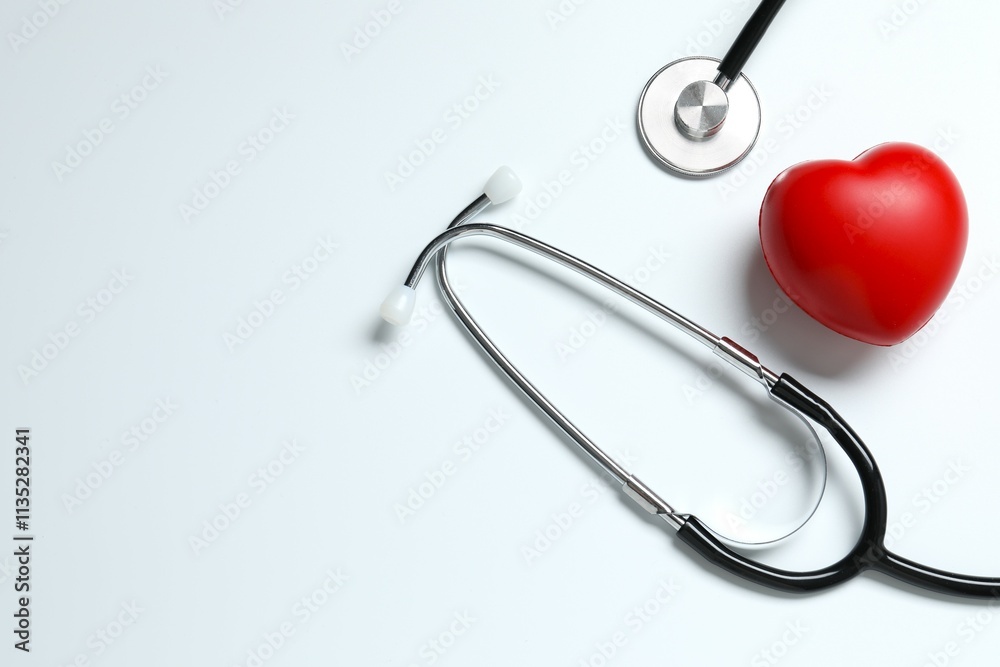 Stethoscope with red heart on white background Stethoscope with red heart on white background