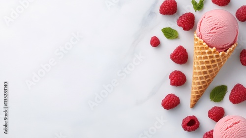 Delicious pink ice cream cones arranged on a light marble surface ready to be...