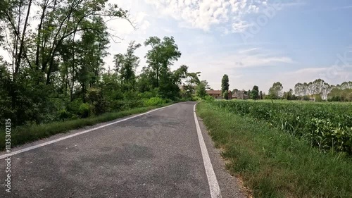 Via Francigena - a paved road entering San Giacomo, Belgioioso, municipality of Linarolo, Province of Pavia, Lombardy region, Italy photo