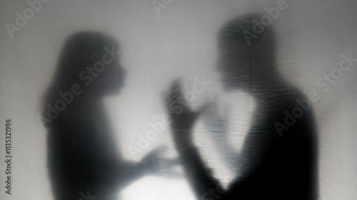 Domestic violence concept. Aggressive man argues and grabs woman by the neck. Husband beats wife. Family quarrel.