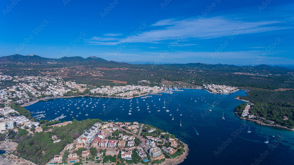 Obraz premium Aerial view of the entrance to the bay and the anchorage on the island of Mallorca in Spain