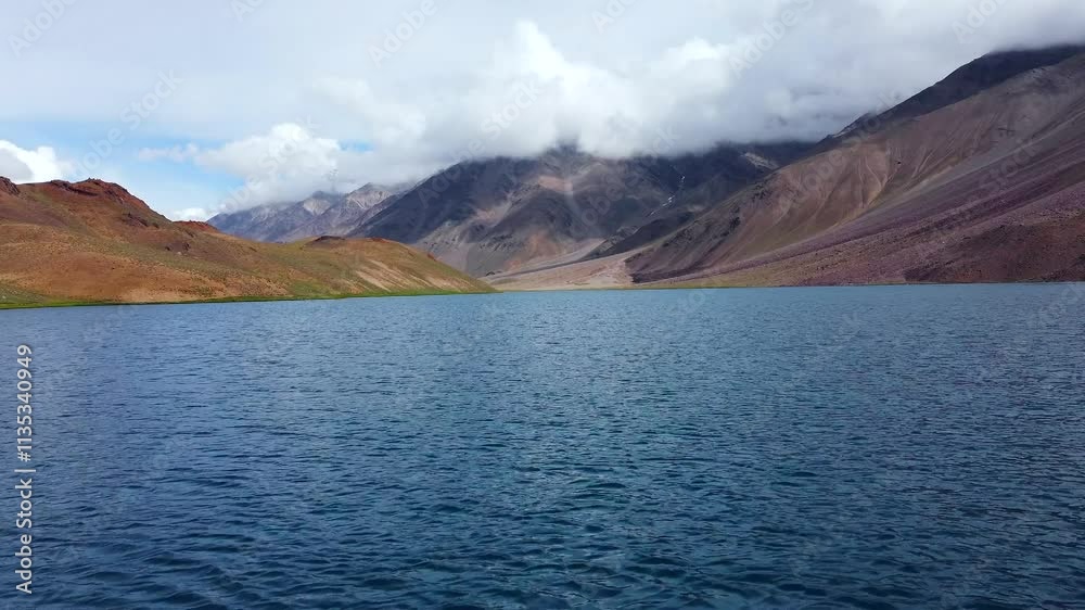 Aerial view of chandratal lake surrounded by snow-capped Himalayan mountains at chandratal in lahaul and spiti valley himachal pradesh, India. Aerial view of chandratal lake surrounded by snow-capped Himalayan mountains at chandratal in lahaul and spiti valley himachal pradesh, India.