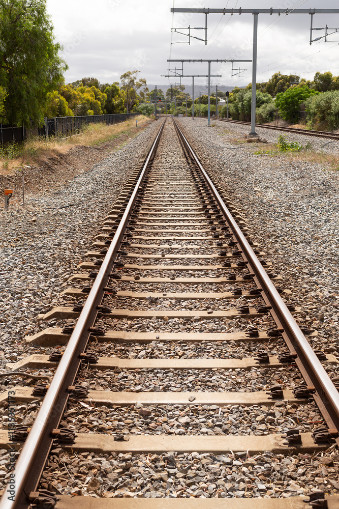 Outdoor view of railway tracks leading away from a suburban train station, Adelaide Outdoor view of railway tracks leading away from a suburban train station, Adelaide