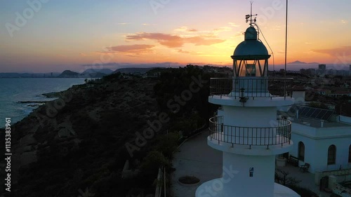 Spectacular aerial view at sunset in the Santapola Salt Flats, over the sea water lagoons, with the city of Santapola in sight, Spain. photo