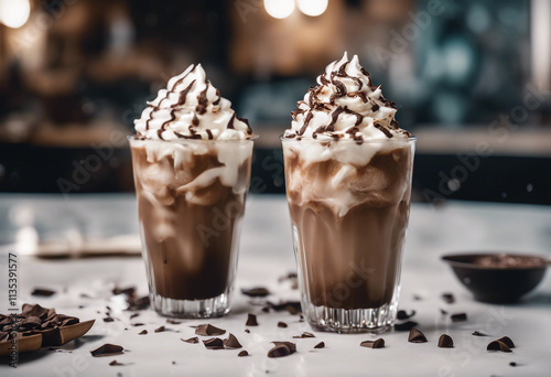 A refreshing iced mocha with whipped cream and chocolate shavings