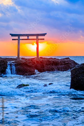 秋の神磯の鳥居と日の出　干潮時　茨城県大洗町　Autumn Kamiiso-no-torii and sunrise. At low tide. Ibaraki Pref, Oarai Town. photo