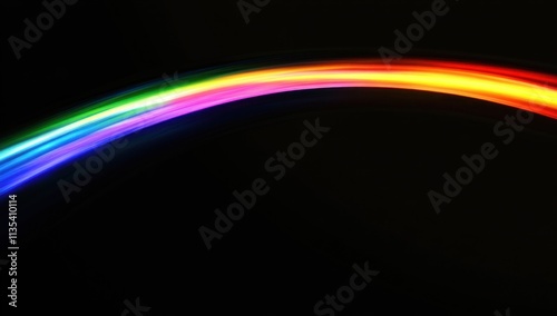 Vibrant rainbow arc on black background.