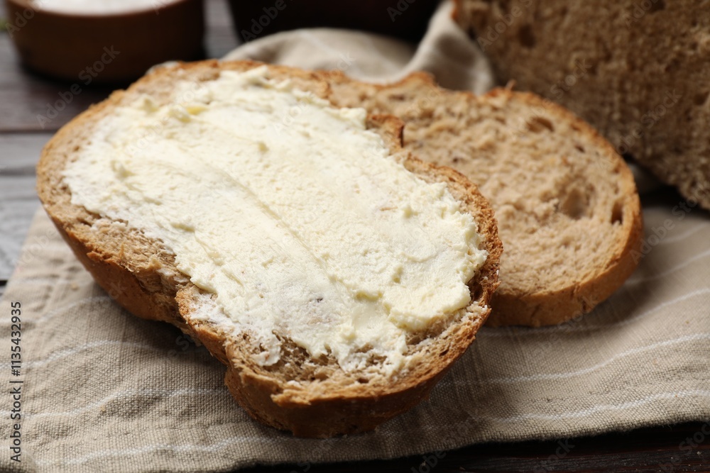 Fresh bread with butter on table, closeup Fresh bread with butter on table, closeup