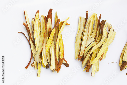 Liquorice sliced on white background. photo