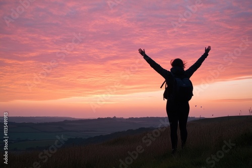 Wallpaper Mural Woman silhouette celebrates sunset on hilltop with outstretched arms. Torontodigital.ca