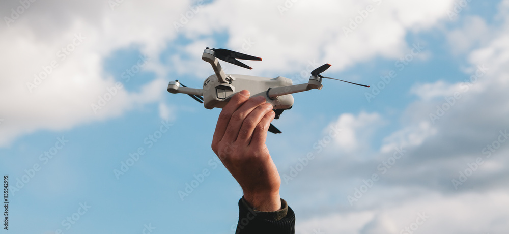 man with drone flying on the roof man with drone flying on the roof