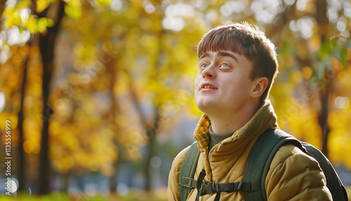 Young Man in Autumn Setting with Backpack