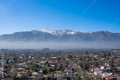 aerial view of Santiago de Chile with the Andes mountain range behind. Financial city, business capital to visit and travel.