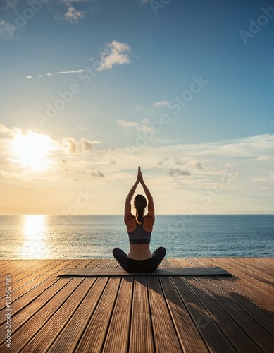 a serene yoga session on a wooden deck overlooking the ocean panorama view