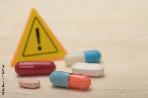 The Danger of Drug Abuse: Warning Signs and Pill Capsules photo