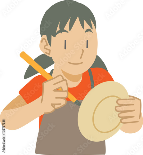 皿に絵付けをする子供