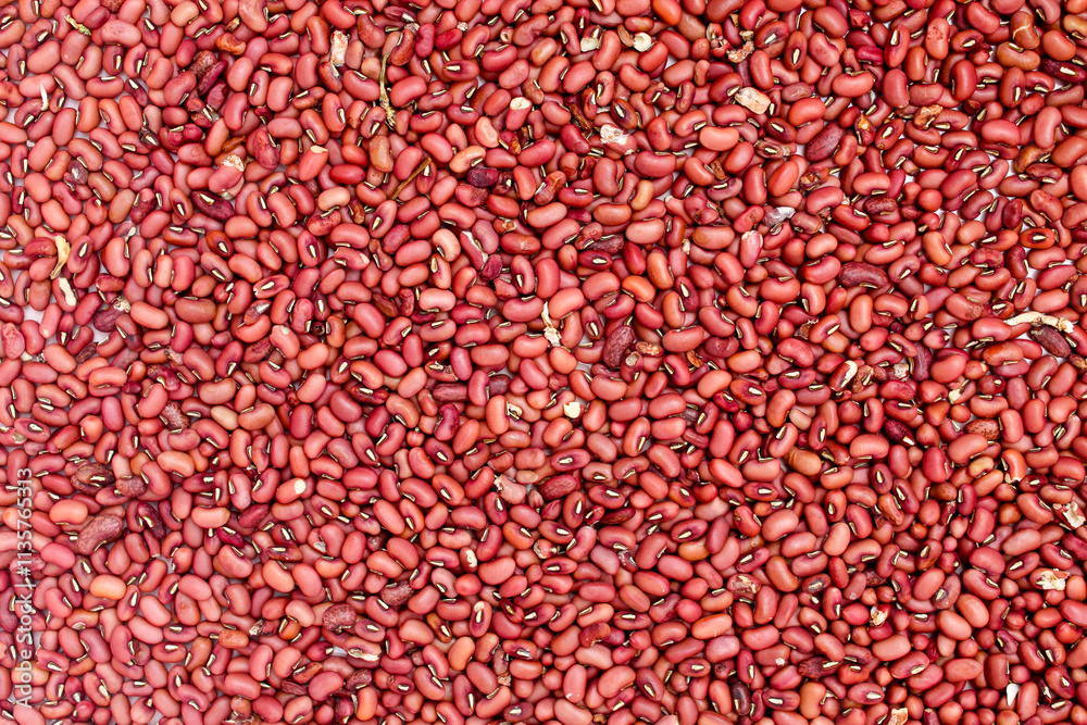 Close-up of red bean texture. Azuki bean background. Red pattern on the bean. Vigna angularis Close-up of red bean texture. Azuki bean background. Red pattern on the bean. Vigna angularis