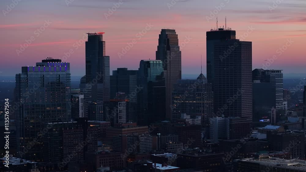4k drone scene of Minneapolis Skyline Downtown Minnesota City Morning Buildings at sunset