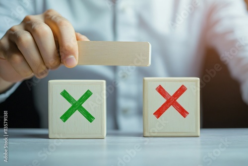 Hand Choosing Right or Wrong Decision Wooden Blocks Green Red Cross photo