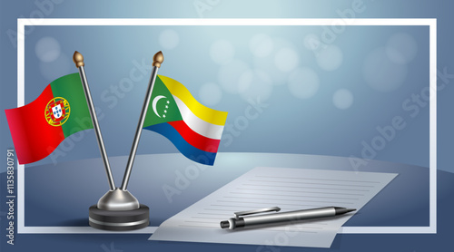 Portugal and Comoros National flags on small table with bokeh background, cooperative relationship