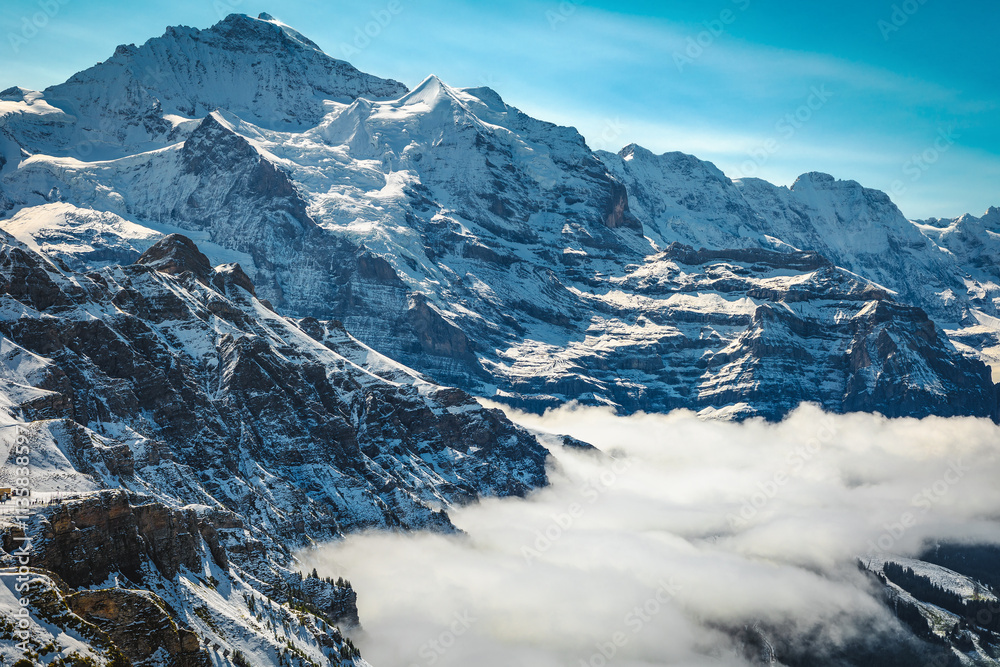 Jungfrau peak above the misty valley, Lauterbrunnen, Switzerland