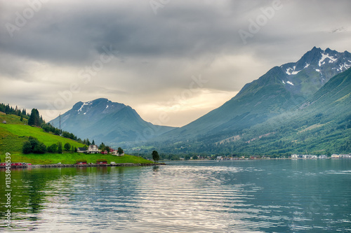 Saebø is a village in Ørsta Municipality, Møre og Romsdal, Norway. The village is located along the Hjørundfjorden, at the eastern end of the Bondalen valley,. photo