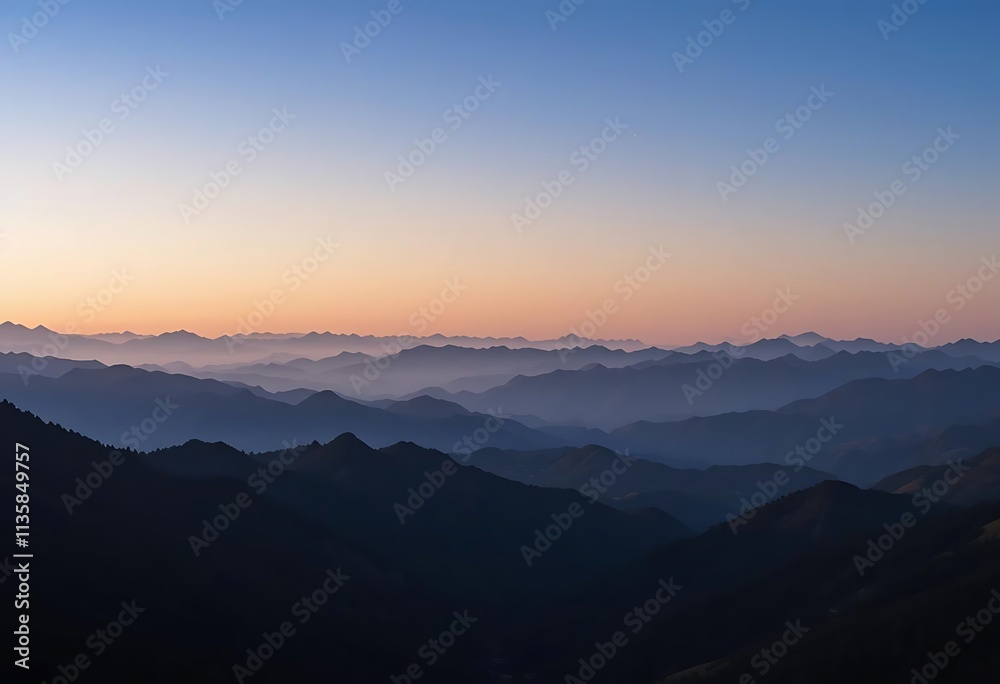 Fototapeta premium Mountain ranges layered with a gradient sky behind