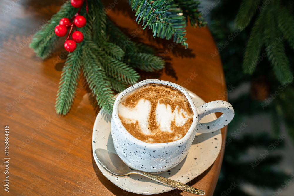 Close up of Hot coffee latte with latte art milk foam in cup mug with Xmas decors and Xmas tree baubles on wood desk Celebrating Merry Christmas and New year,Merry x-mas