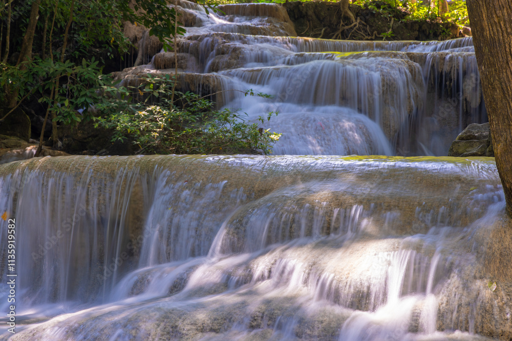 Erawan Waterfall in the rainforest in north of Kanchanaburi, Thailand Erawan Waterfall in the rainforest in north of Kanchanaburi, Thailand