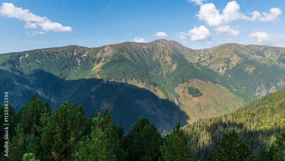 Baranec, Smrek and few other hills from Nizny Ostredok hill on Otrhance mountain ridge in Western Tatras mountains in Slovakia Baranec, Smrek and few other hills from Nizny Ostredok hill on Otrhance mountain ridge in Western Tatras mountains in Slovakia