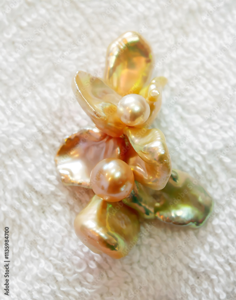 Elegant Natural Pearls on a Textured Background Elegant Natural Pearls on a Textured Background