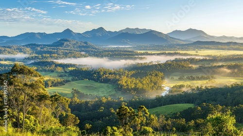 Captivating view of misty distant mountains scenic valley nature photography sunlit environment breathtaking perspective natural beauty