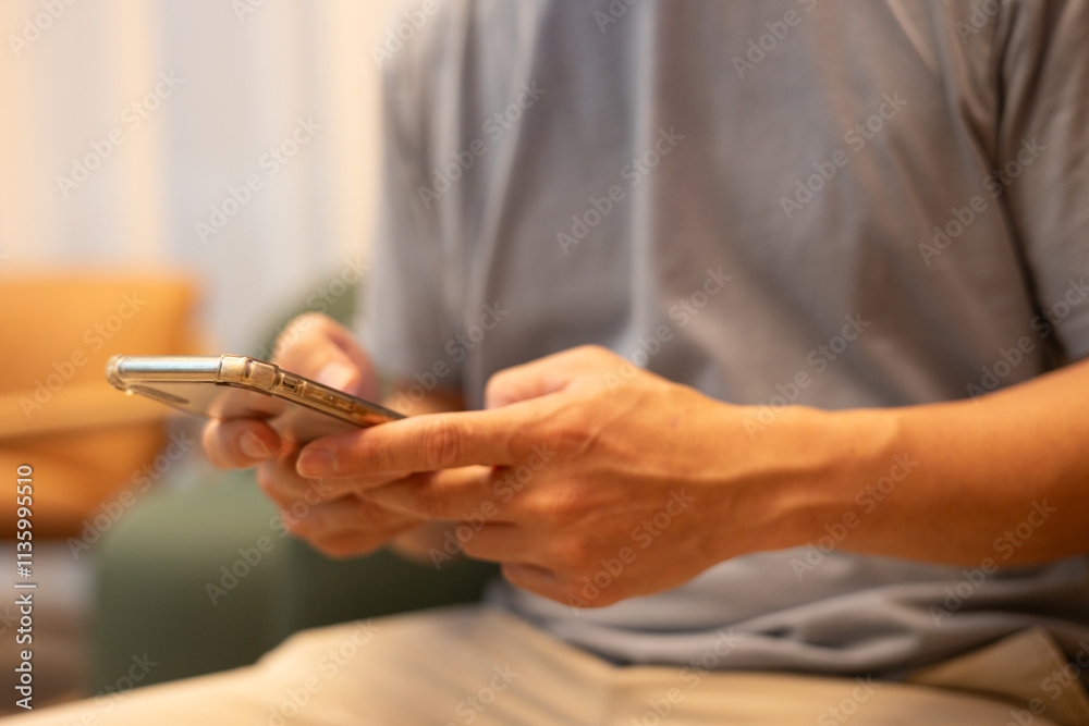 close up Businessman sitting at office table using mobile phone while online working at home office, business casual, telecommuting, working from home, close up Businessman sitting at office table using mobile phone while online working at home office, business casual, telecommuting, working from home,