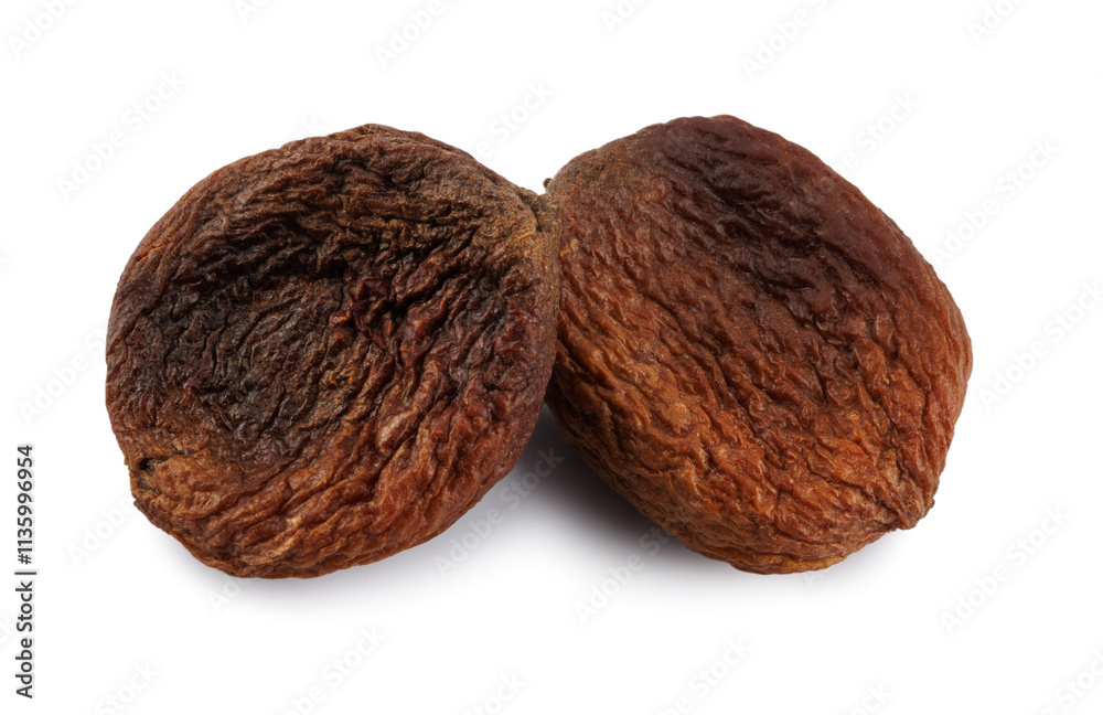 Dark mountain dried apricots isolated on a white background. Delicious and healthy dried apricots.
