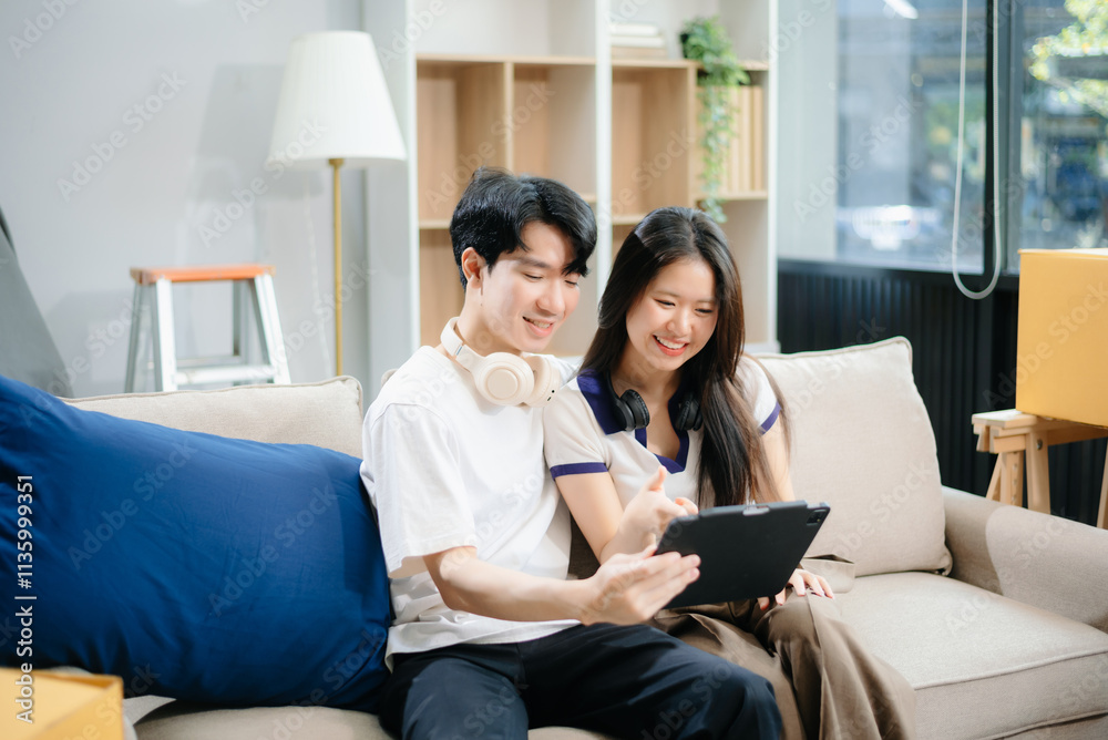 Young couple organizing belongings in a cozy home with boxes and luggage. Perfect for themes of moving Young couple organizing belongings in a cozy home with boxes and luggage. Perfect for themes of moving