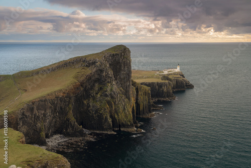 Neist point lighthouse sunset at Skye Island, Scotland photo