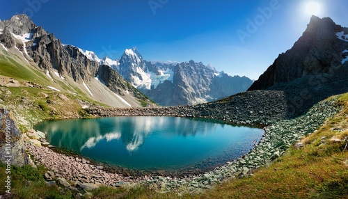 a turquoise lake in the mountains	
