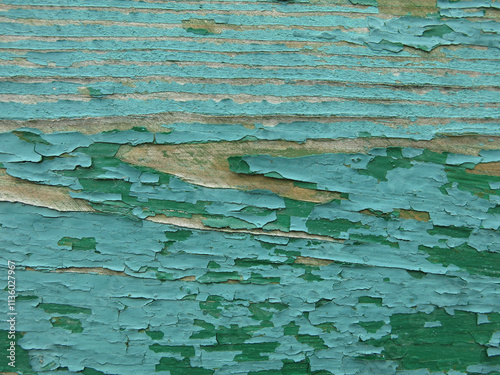 wood painted with peeling green paint