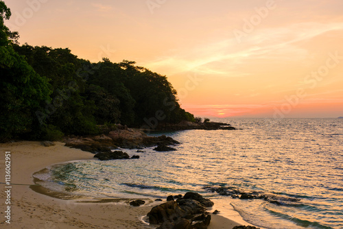 Sunset tranquility on Koh Munnork Island in Rayong, Thailand photo